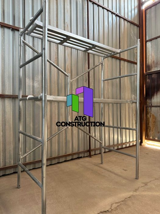 Строительные леса складные оцинкованные комплект с настилом и колесами