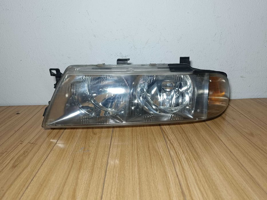 Фара Левая Mitsubishi Diamante 95-05г Митсубиси Диамант передняя