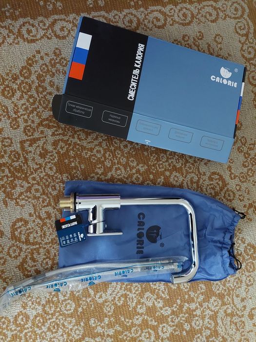 Сместитель "Calorie" для кухни новый.