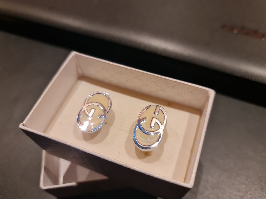 Butoni gucci argintii