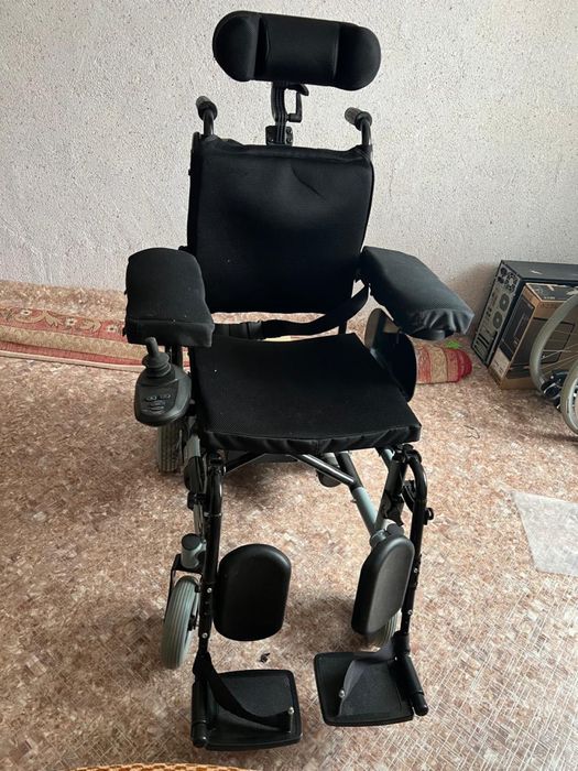 Электрическая инвалидная коляска