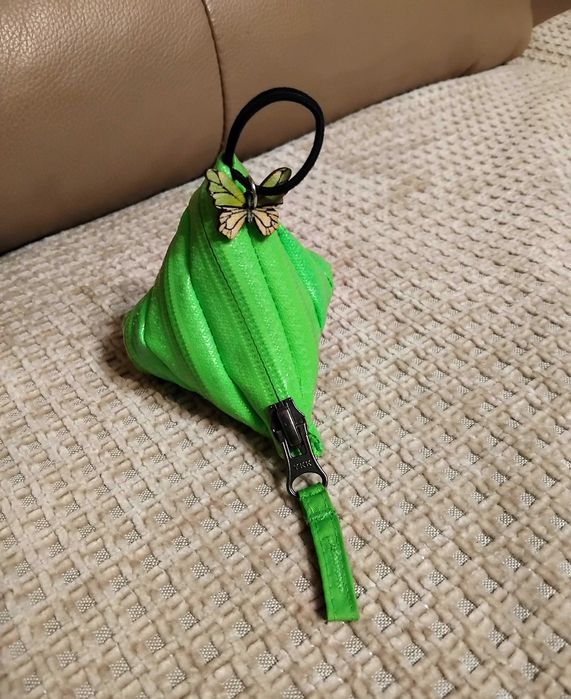 Ключодържател с възможност за прибиране на стотинки