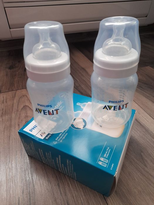 4бр. Шишета Philips avent и Поставка за чаша
