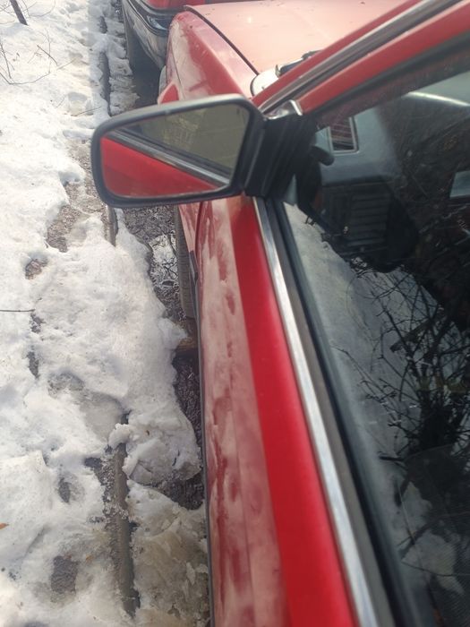 Боковое левое зеркало Mazda 323