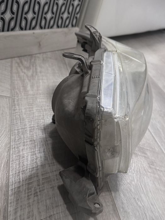 Водительская фара highlander