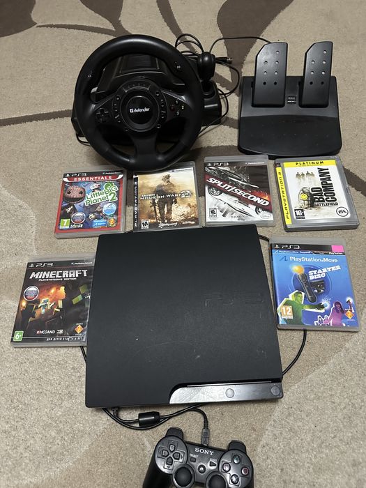 Продам ps3 с играми и руль с педалями и диски