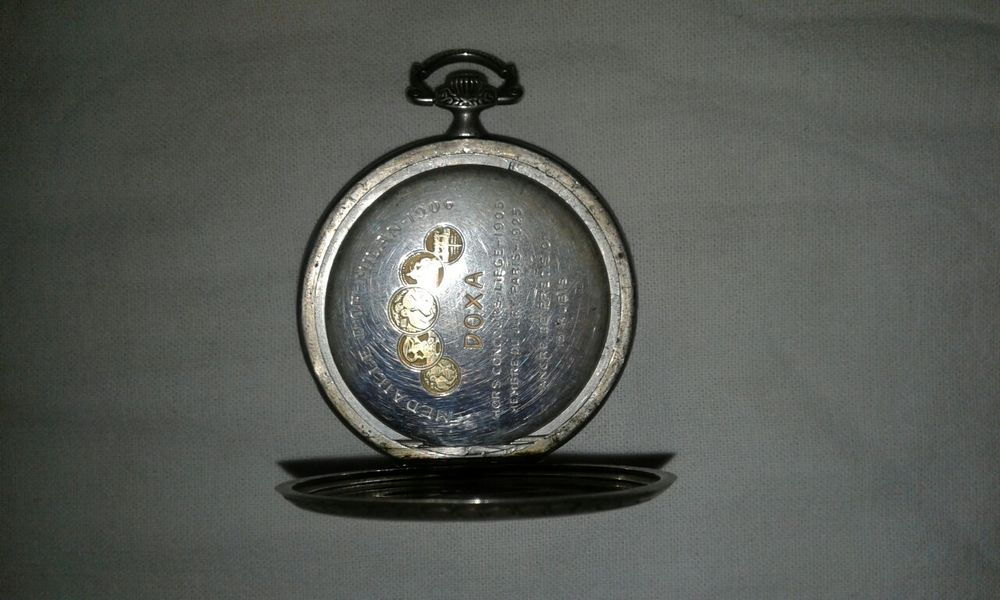 Карманные часы DOXA
