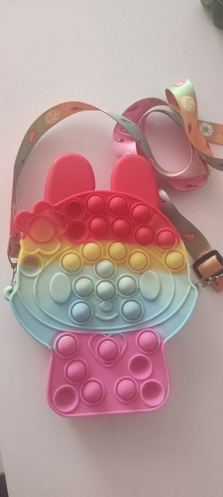 Продам игрушки попит и сумочку попит