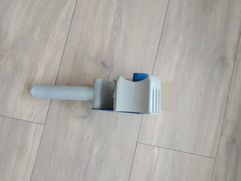 Dispenser cu maner pentru aplicat banda adeziva 48 mm