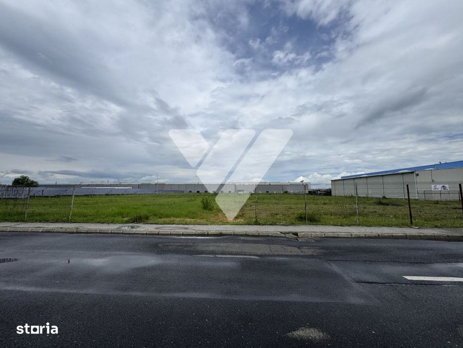 Teren intravilan industrial 11.059 mp, PUZ aprobat, asfalt - zona Vest