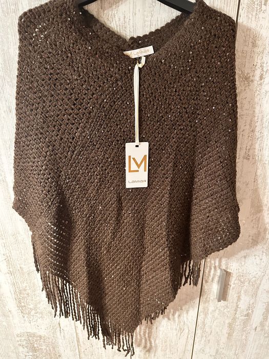 Дамски елеци и пончота намалени