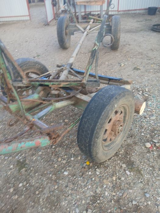 Vand caruta de un cal buna pe fier butuci buni cos  nou