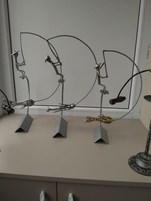 Сувенирчики неваляшки,рыбаки, акробаты.