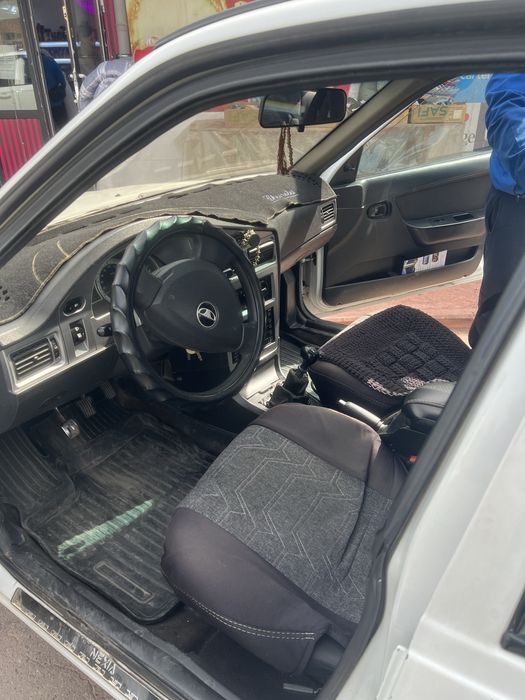 Нексия 2, белый цвет