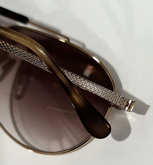Солнцезащитные очки Dunhill.