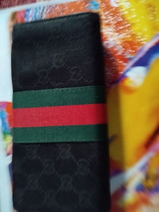 Portofel gucci  in stare foarte buna