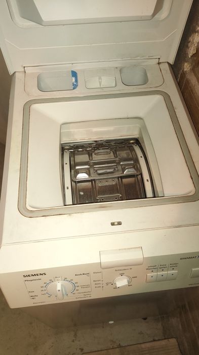 Пералня Сименс с горно зареждане.