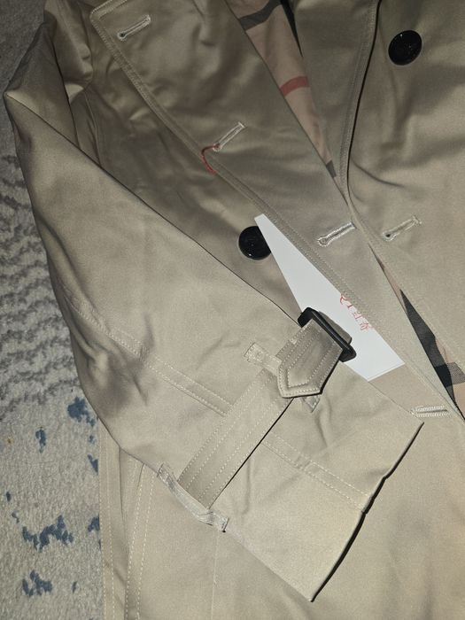 Продам тренч новый..