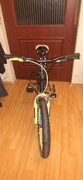 Bicicleta copii ca noua cu roti ajutatoare action one