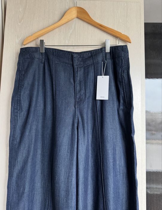 Pantaloni evazati aspect denim XL Mango