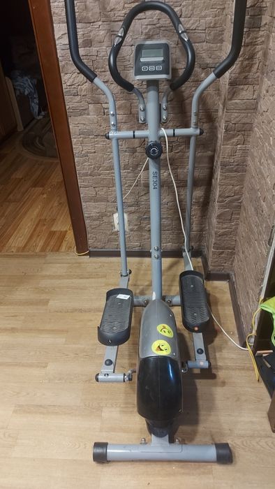 Продам элептический тренажер
