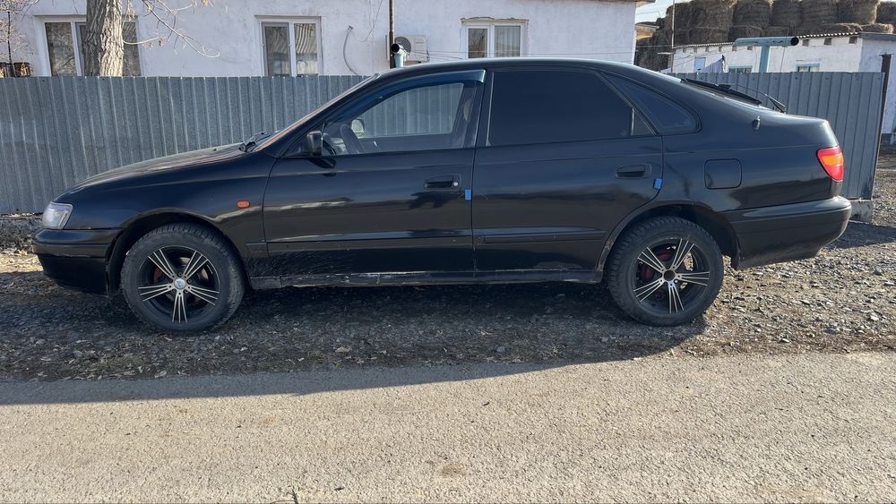 Тойота карина е.