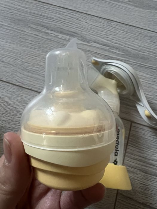 Молокоотсос ручной medela