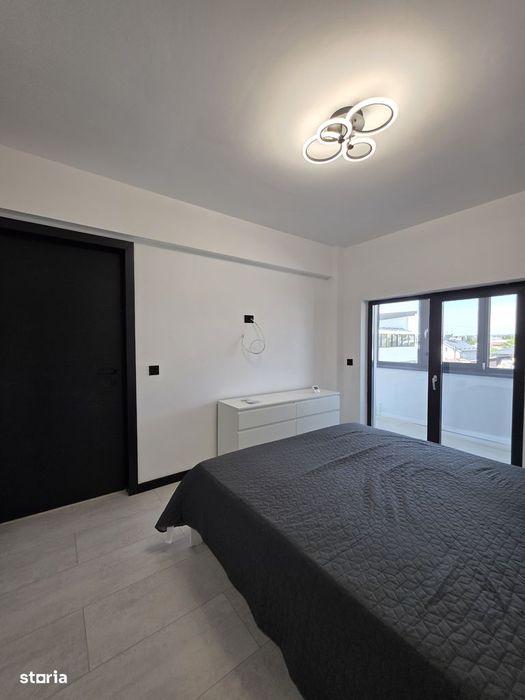 Apartament bloc nou,parcare proprie, mobilat.
