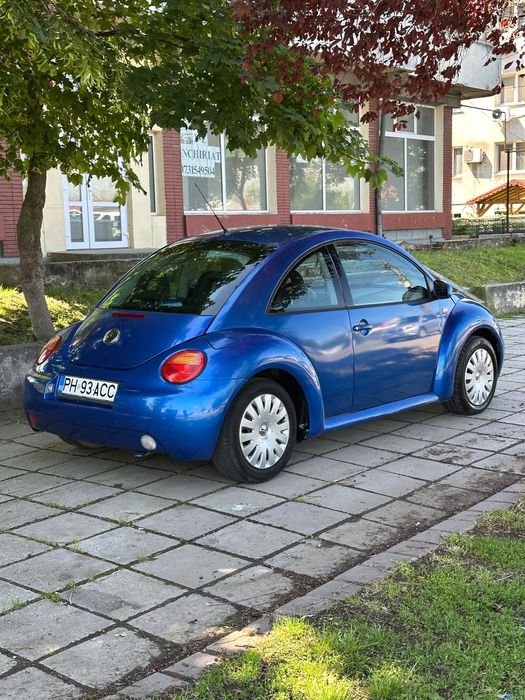VW Beetle - 1.6 benzina - 102 CP - 178k Km - E4 - AC - Incalzire scaune - Geamuri si oglinzi electrice - Inchidere centralizata - 2002