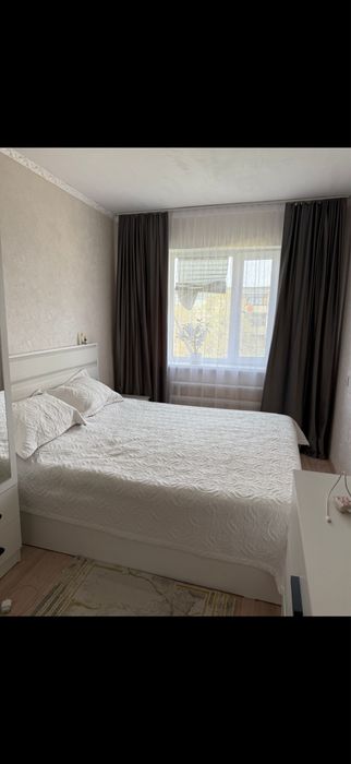 Кровать с тумбочками