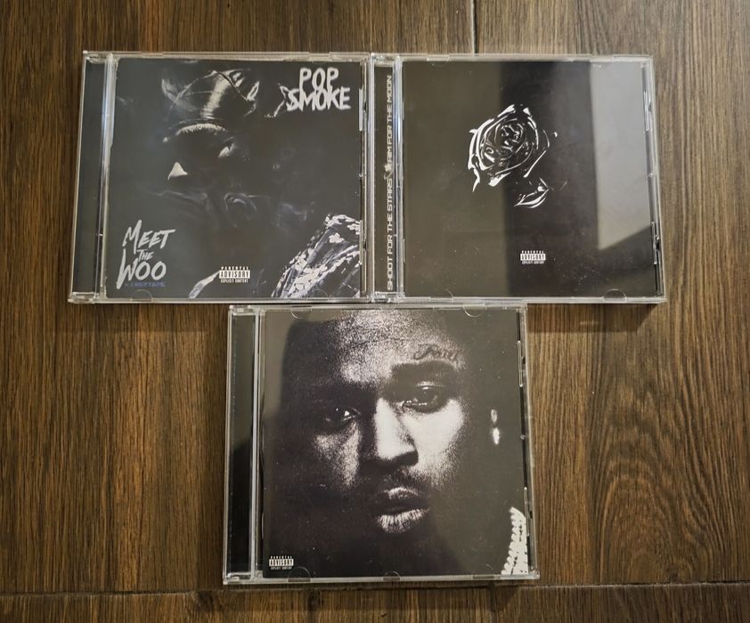 CD дискове на Pop Smoke и 50 cent