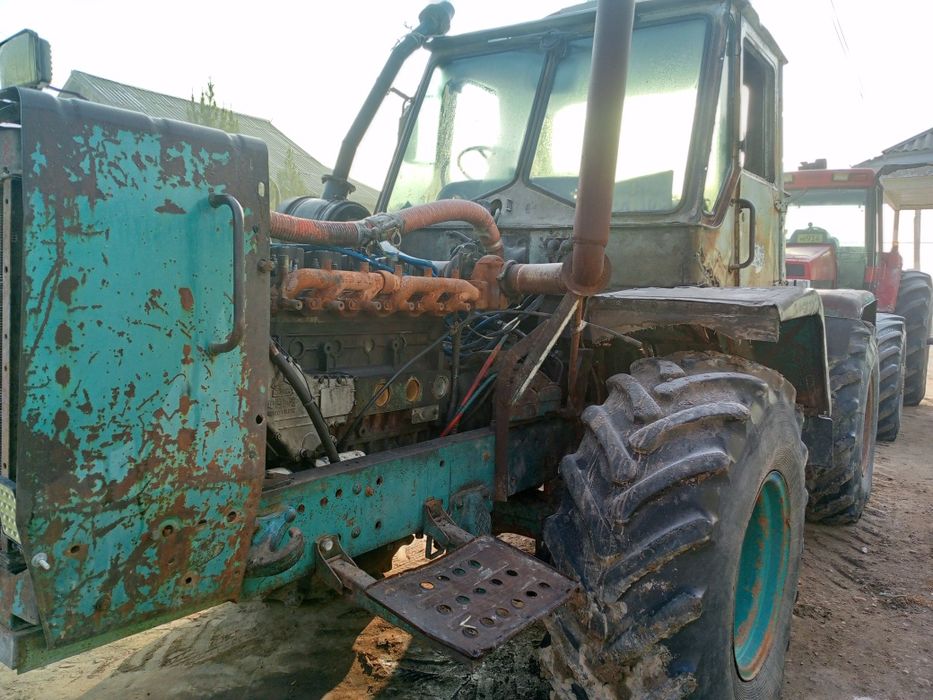 Трактор к 150 сотилади ,чакман мотор,каропка койилган ишлаши Зур