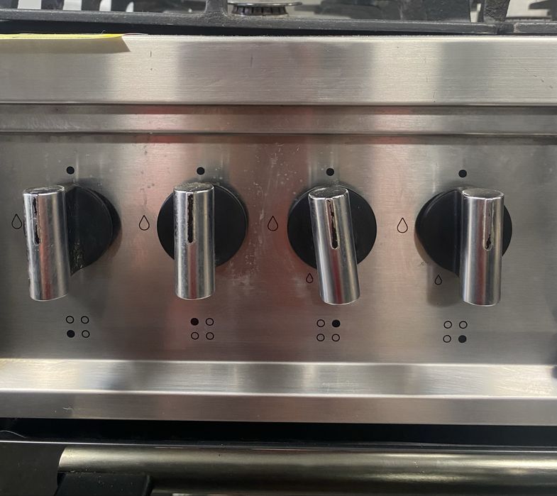 Комбинирана готварска печка на газ и ток Indesit KPST72S/DK