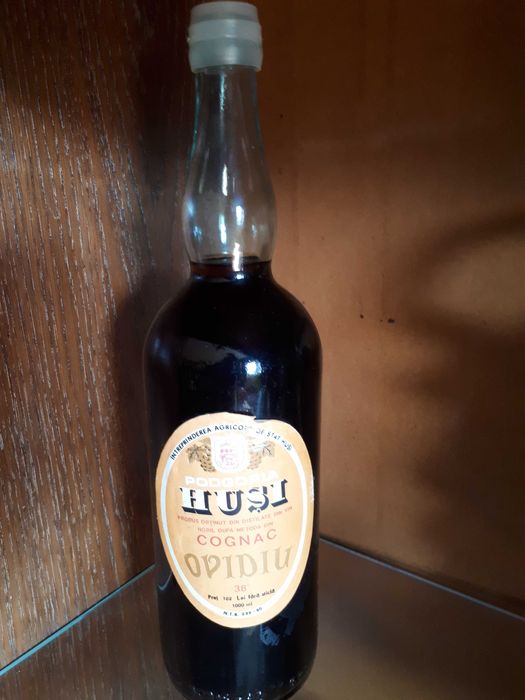 CONIAC OVIDIU,  HUSI 40%vol. 1 L,    îmbuteliat în anii 1975-1980