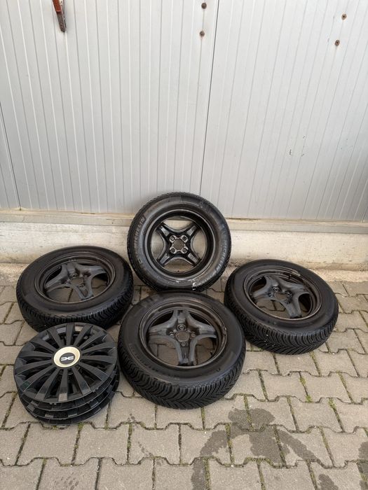 Set roți originale Dacia R15 + Michelin CrossClimate 2 DOT 2024 + capace