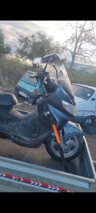 Suzuki Burgman ( nu honda,yamaha)