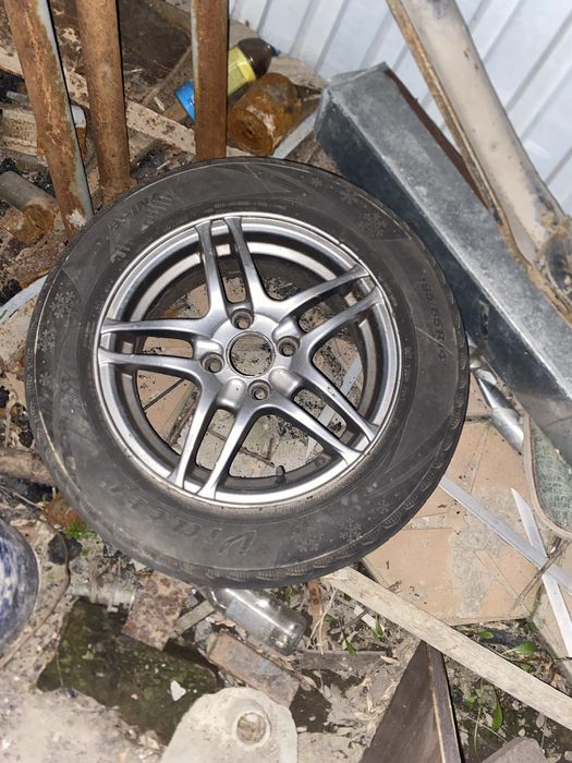 Диск с резиной 14 диаметр титанка