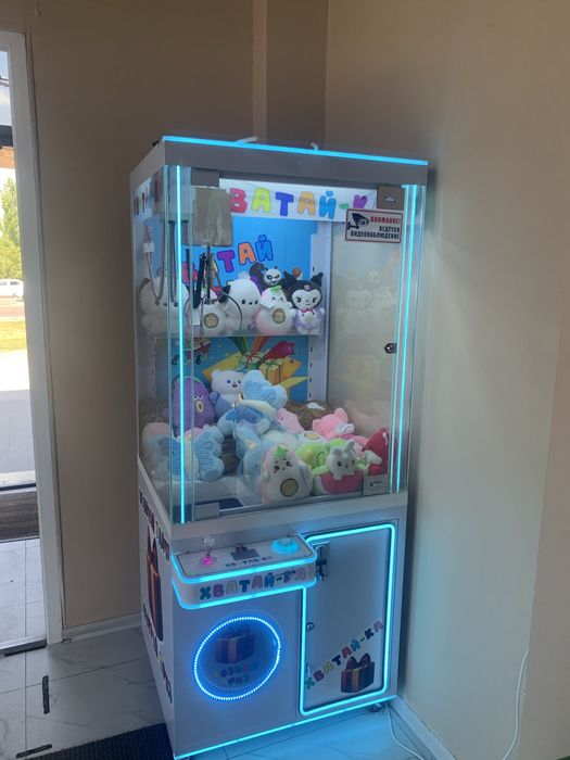 Игровой аппарат хватайка