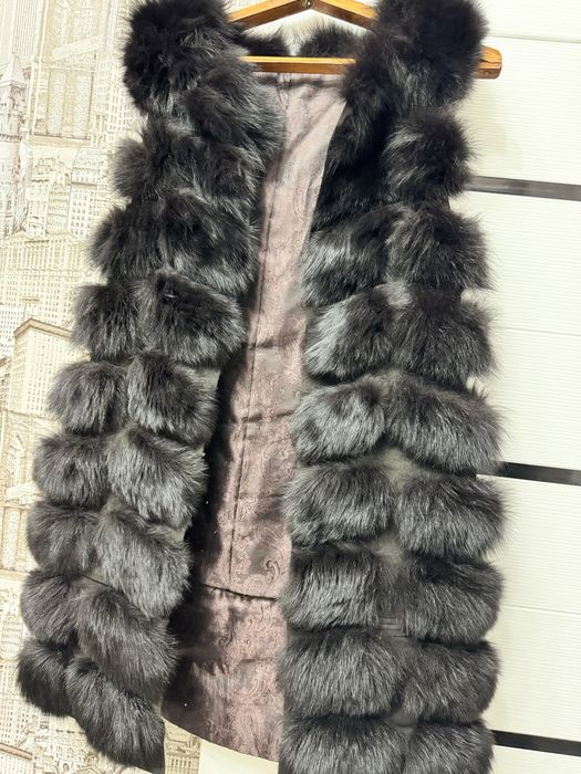 Продам  меховую жилетку