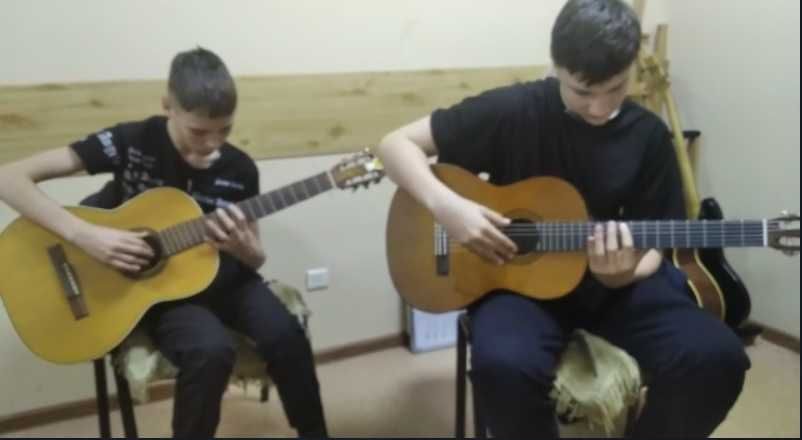 Обучение на гитаре