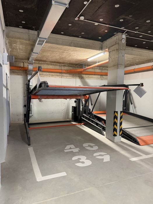 Паркинг платформа за паркиране на две нива