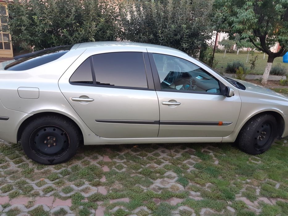 Ceasuri bord volan pilot automat   Renault Laguna 2 1.9 dci 120 cp