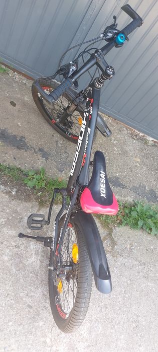 Vând bicicleta copii 9-12 ani