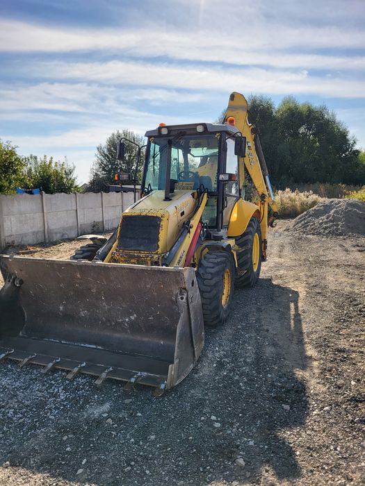 Vând buldoexcavator New Holland