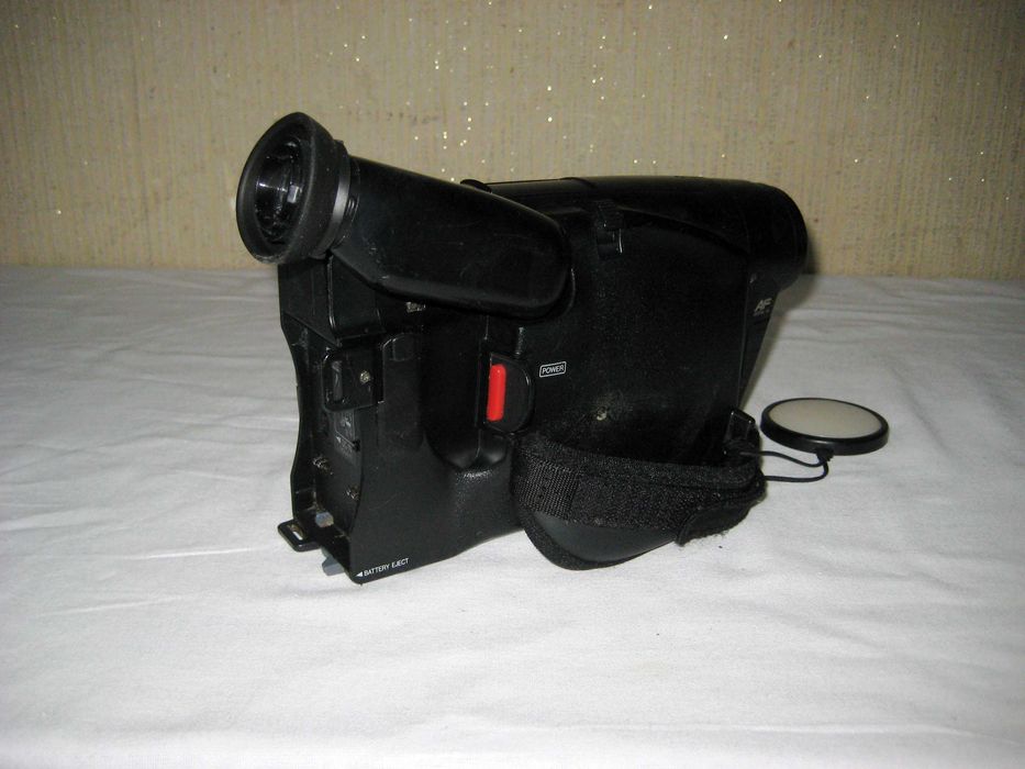 Видеокамера Panasonic нет батареи и зарядный блок атак рабочим состоян