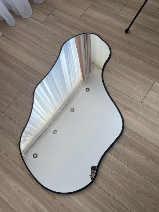 Асиметрично ефектно огледало