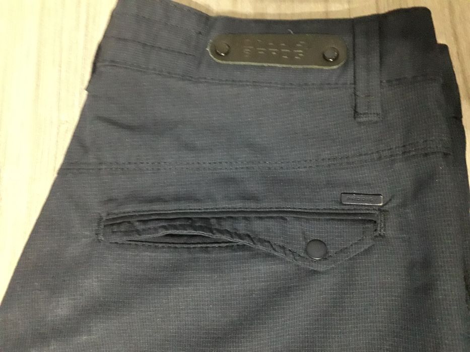Продам фирменные брюки  р 48