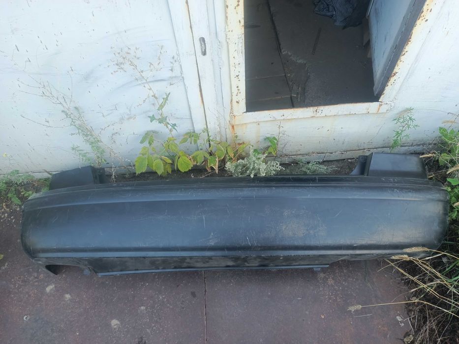 Бампер задний Камри 20