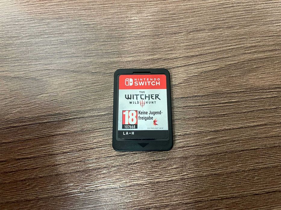 Игровая консоль Nintendo Switch OLED красный-синий