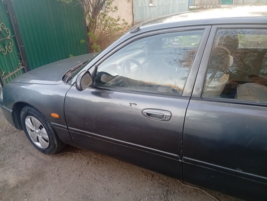 Продам машину mazda 626 Кронос девяносто шестой год.